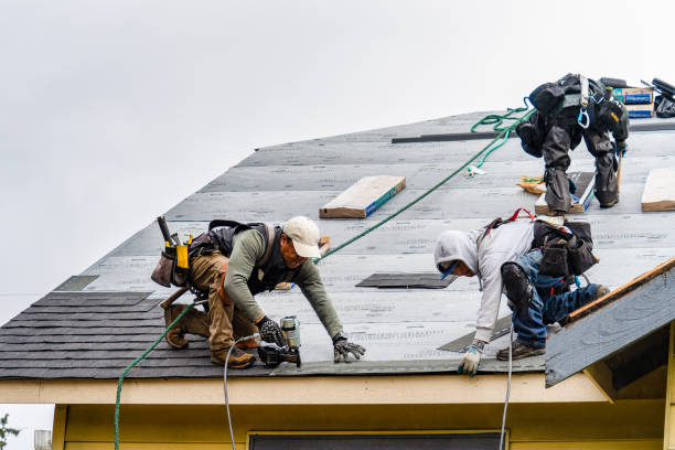 Professional Gutter Installation technician working in Brewster, MA